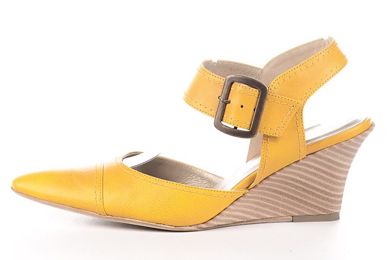 Mustard yellow women's open back shoes, with an instep strap. Tapered toe. Medium wedge heels. Profile view - Florence KOOIJMAN